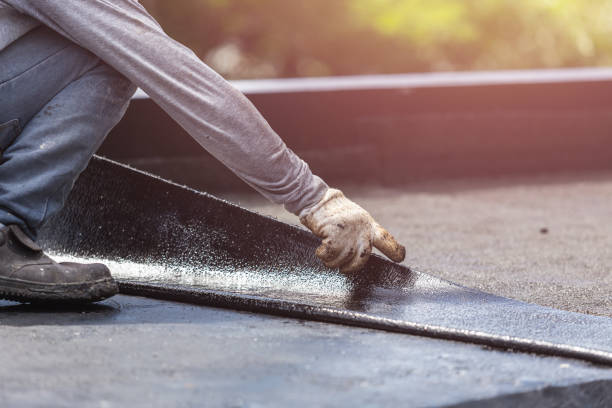 Professional Emergency Waterproofing technician working in Patricksburg, IN